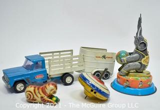 Group of Vintage Toys Including Tonka Truck and Trailer and Tin Litho Wind-Up Toys and Top.