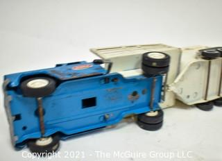 Group of Vintage Toys Including Tonka Truck and Trailer and Tin Litho Wind-Up Toys and Top.