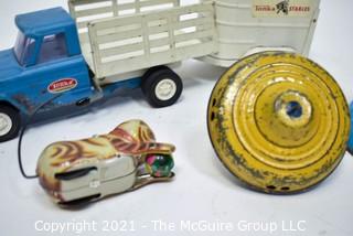 Group of Vintage Toys Including Tonka Truck and Trailer and Tin Litho Wind-Up Toys and Top.