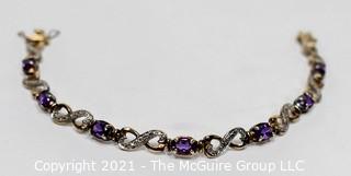 Sterling Silver with Cut Amethyst Mounted Stones Link Bracelet.  Measures 8" long.