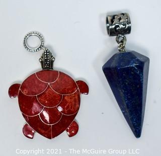 Two Sterling Silver with Semi-precious stone pendants.  Includes Sponge Coral Inlaid Turtle and Lapis Lazuli Cone Shape Pendulum Pendant 