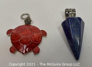 Two Sterling Silver with Semi-precious stone pendants.  Includes Sponge Coral Inlaid Turtle and Lapis Lazuli Cone Shape Pendulum Pendant 