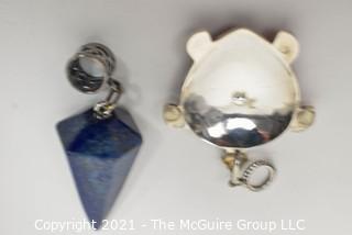 Two Sterling Silver with Semi-precious stone pendants.  Includes Sponge Coral Inlaid Turtle and Lapis Lazuli Cone Shape Pendulum Pendant 