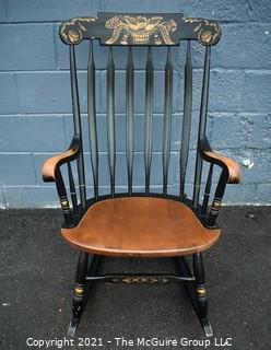 Vintage L. Hitchcock Rocking Chair In Black With Gold Tone Stenciled Accents and Spindle Back.  Clearly marked on the back , ‘L. Hitchcock. Hitchcocksville, Conn Warranted ’ With Backward N’s 