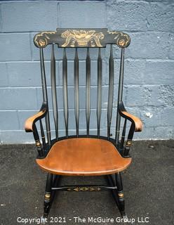 Vintage L. Hitchcock Rocking Chair In Black With Gold Tone Stenciled Accents and Spindle Back.  Clearly marked on the back , ‘L. Hitchcock. Hitchcocksville, Conn Warranted ’ With Backward N’s 