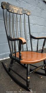 Vintage L. Hitchcock Rocking Chair In Black With Gold Tone Stenciled Accents and Spindle Back.  Clearly marked on the back , ‘L. Hitchcock. Hitchcocksville, Conn Warranted ’ With Backward N’s 