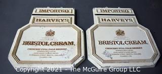 Two (2) Vintage Cast Iron Imported Harveys Bristol Cream Advertising Signs.  Each Measure 11" X 14". 