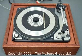 Vintage record turntable: DUAL 1019 four speed turntable in wood plinth but no cover. Audio-Technica stylus. Powers on and most operations cycle properly.