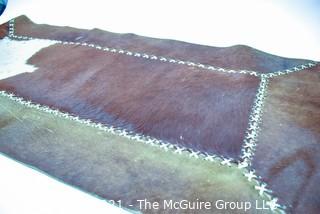 Hand Stitched Patchwork Cowhide Leather Rug.  Measures 28" x 45".