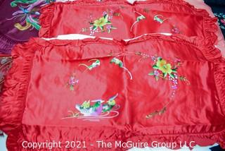 Selection of embroidered silk pillow covers with Asian and bird motifs