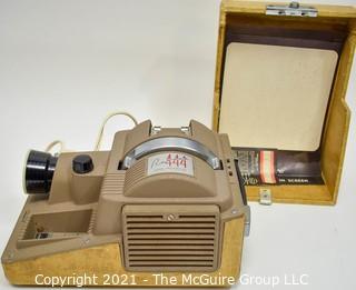 Vintage Revere Model 444 2x2" slide projector.