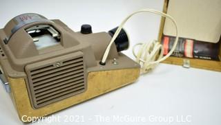 Vintage Revere Model 444 2x2" slide projector.