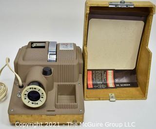 Vintage Revere Model 444 2x2" slide projector.