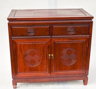 Chinese Rosewood Cabinet With Medallion Motif.  Measures 19" x 34" x 39".