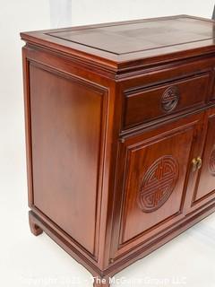 Chinese Rosewood Cabinet With Medallion Motif.  Measures 19" x 34" x 39".