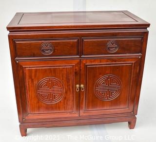 Chinese Rosewood Cabinet With Medallion Motif.  Measures 19" x 34" x 39".