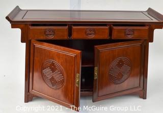 Chinese Rosewood Credenza With Medallion Motif. Measures 18" x 33"x 55".