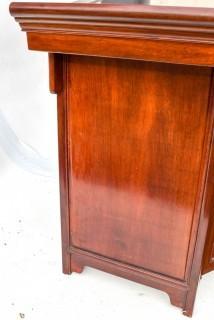 Chinese Rosewood Credenza With Medallion Motif. Measures 18" x 33"x 55".