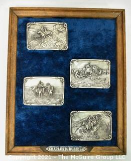 Collection of Four (4) Frederick Remington Belt Buckles Mounted in Frame.  