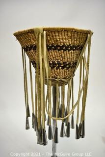 Native American Apache Made Burden or Jingle Basket. Basket measures 6" in diameter and 11" long including bells.  