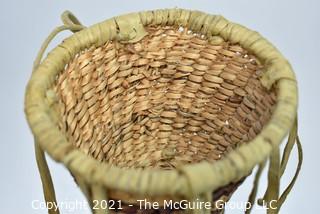 Native American Apache Burden or Jingle Basket. Basket measures 4" in diameter and 6" long including bells.