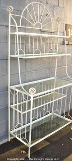 White Wrought Iron Bakers Rack with Four Shelves with Glass Inserts.