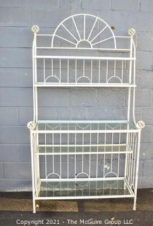 White Wrought Iron Bakers Rack with Four Shelves with Glass Inserts.