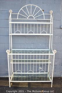 White Wrought Iron Bakers Rack with Four Shelves with Glass Inserts.