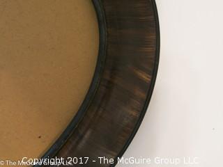 Oval wood grained frame; 19 x 25"