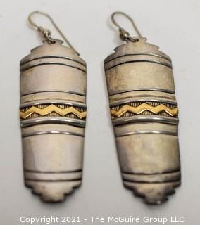 Pair of Vintage 14K Gold and Sterling Silver Pierced Earrings made by Navajo Artists Tommy Secatero (TAS) & Millicent Rogers (MM ROGERS).  They measure 2“ long. 