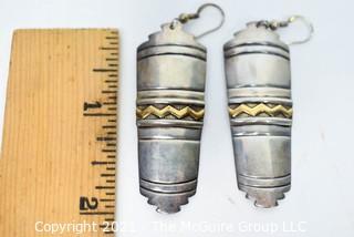 Pair of Vintage 14K Gold and Sterling Silver Pierced Earrings made by Navajo Artists Tommy Secatero (TAS) & Millicent Rogers (MM ROGERS).  They measure 2“ long. 