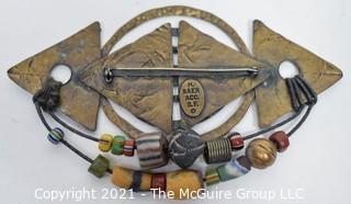 Vintage Artisan Made Hammered Metal Brooch with Native American Trade Beads Brooch Stamped M (Marjorie) Bauer San Francisco.  Measures 4" Wide. 