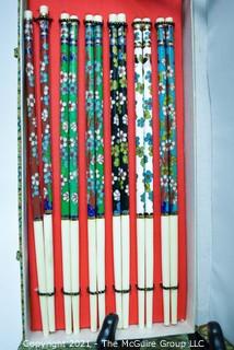 Group of Asian Decorative Items Including Chopsticks and Cloisonne Urns, Both in Presentation Boxes. One chopstick has separated from the handle. 