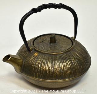 Three (3) Asian Tea Pots Made of Porcelain and Metal.