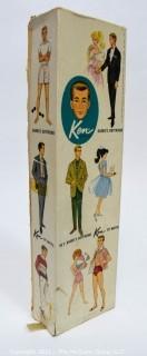 Vintage 1961 Blonde Ken Doll, Barbies Boyfriend, Stock No. 750  In Original Box with Pedestal and Group of Matching Mattel Made Clothes.