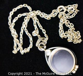 Sterling Silver Double-Sided Locket on Chain.  Measures 20" long.