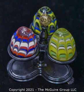 Three (3) Decorative Hand Blown Glass Eggs in Stand. 