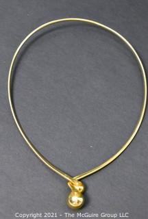 Gold-Tone Torque Style Necklace with Bead Closure. 