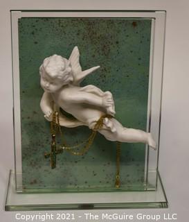 Porcelain Angle Mounted on Glass With Crucifix. Measures 6" x 7". 