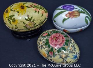 Three (3) Egg Shaped Trinket Boxes - 2 Lacquer and 1 Porcelain.