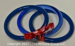 Set of Three (3) Blue Glass Bangle Bracelets.