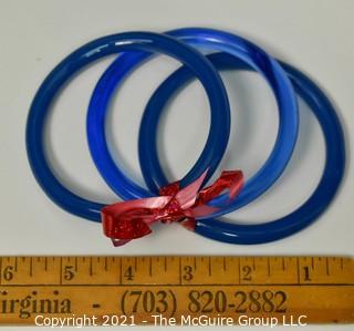 Set of Three (3) Blue Glass Bangle Bracelets.