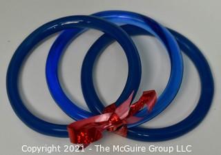 Set of Three (3) Blue Glass Bangle Bracelets.