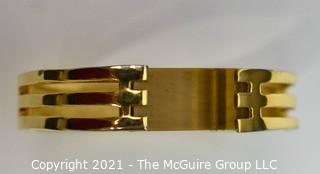 Gold Plated Clamp Style Bangle Bracelet with Tigers Eye Stone Center. 