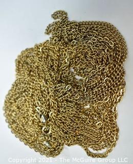 Multi-Strand Gold Tone Necklace.