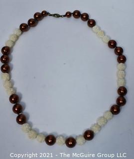 Carved Bone Bead with Faux Copper Pearl Necklace. 24"