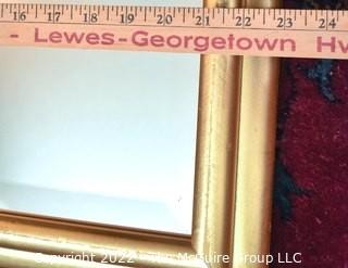 Gilt Framed Wall Mirror.  Measures 23" x 19".