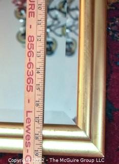 Gilt Framed Wall Mirror.  Measures 23" x 19".