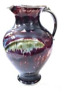 Edgecomb Pottery Large Traditional Pitcher Plum Metal Glaze.  Measures 12" tall.