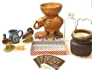 Group of Decorative Items Including Antique Bottle, Rug Coasters, Lefton Porcelain Duck Figurines, Elephant Stand and Vintage Coronet Hand Blown Cocktail Swizzle Sticks. 